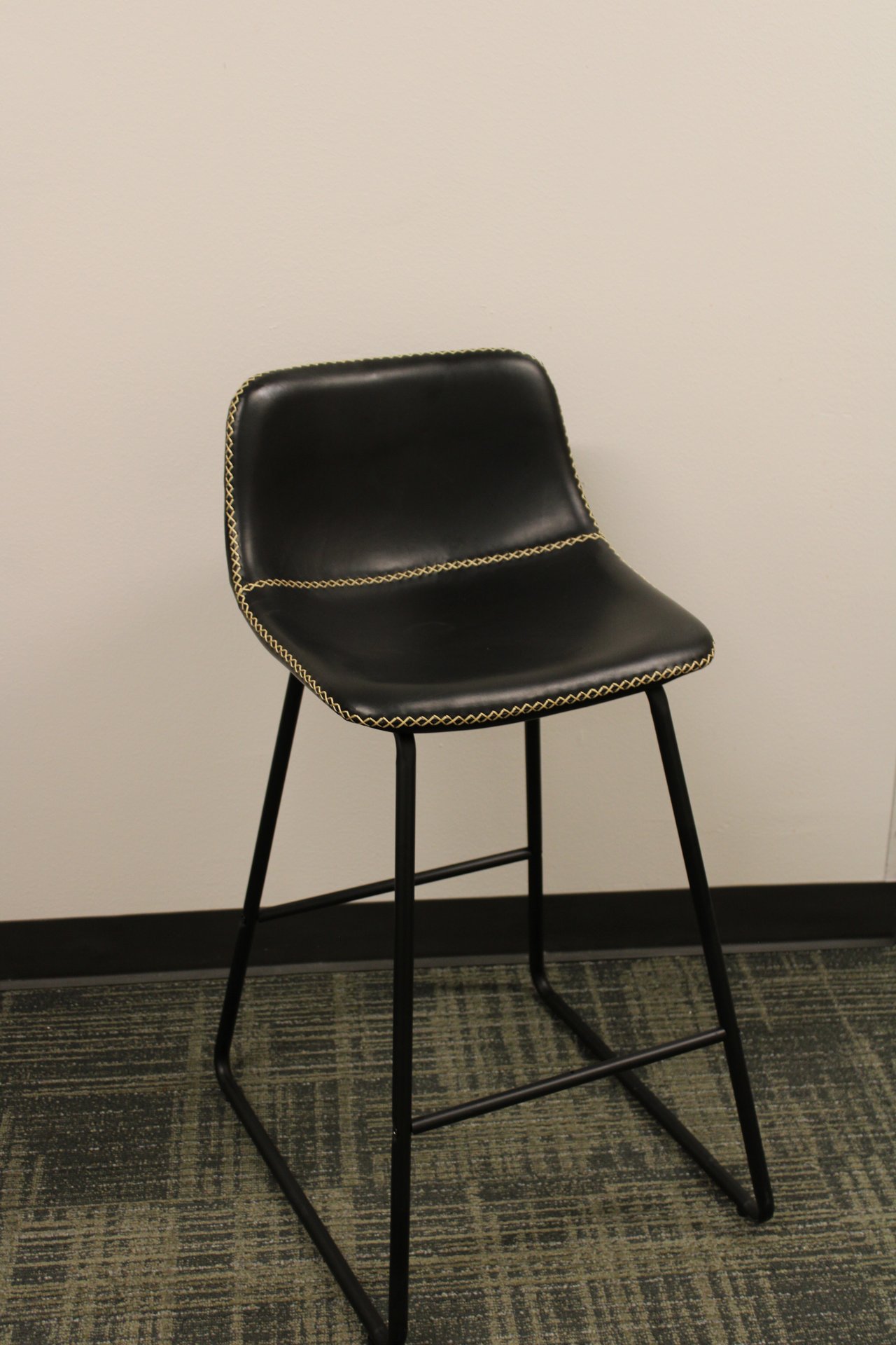 Black leather bar stool